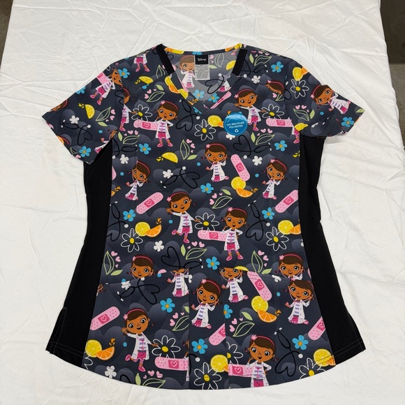 Disney Tops - Disney Doc McStuffins Scrub Top Size S NWOT